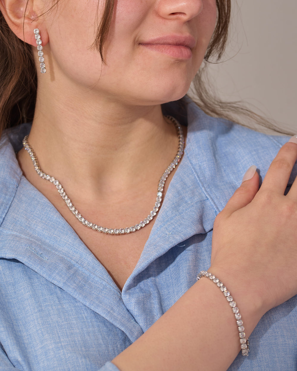 Stainless steel crystal tennis necklace, drop earrings, and tennis bracelet jewelry set
